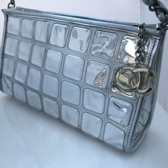 CHANEL Handbags - Chanel Bag Vinyl Ice Cube Pochette Shining Silver